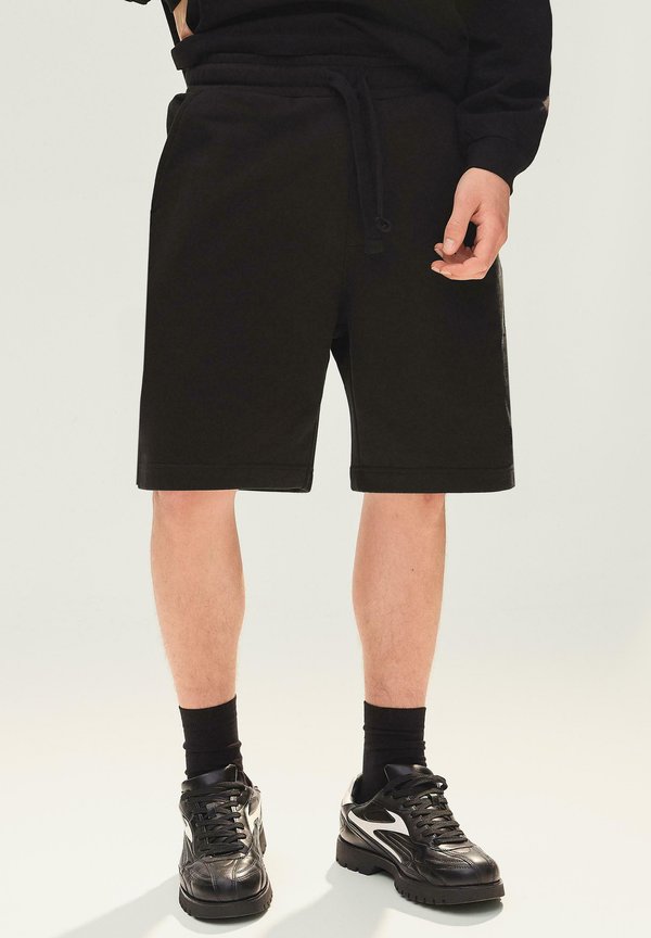 Bershka JOGGER - Tracksuit bottoms - black