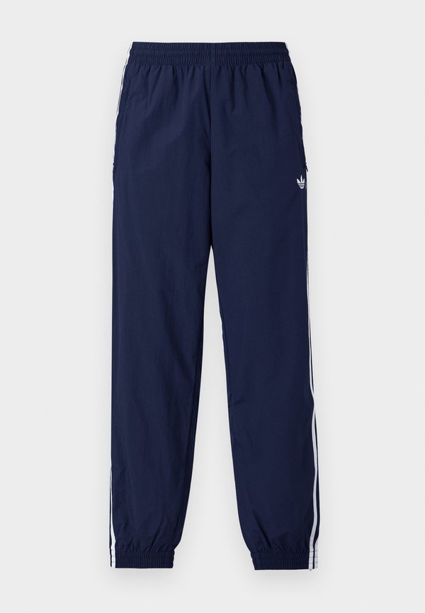 adidas Originals FIREBIRD - Tracksuit bottoms - night indigo