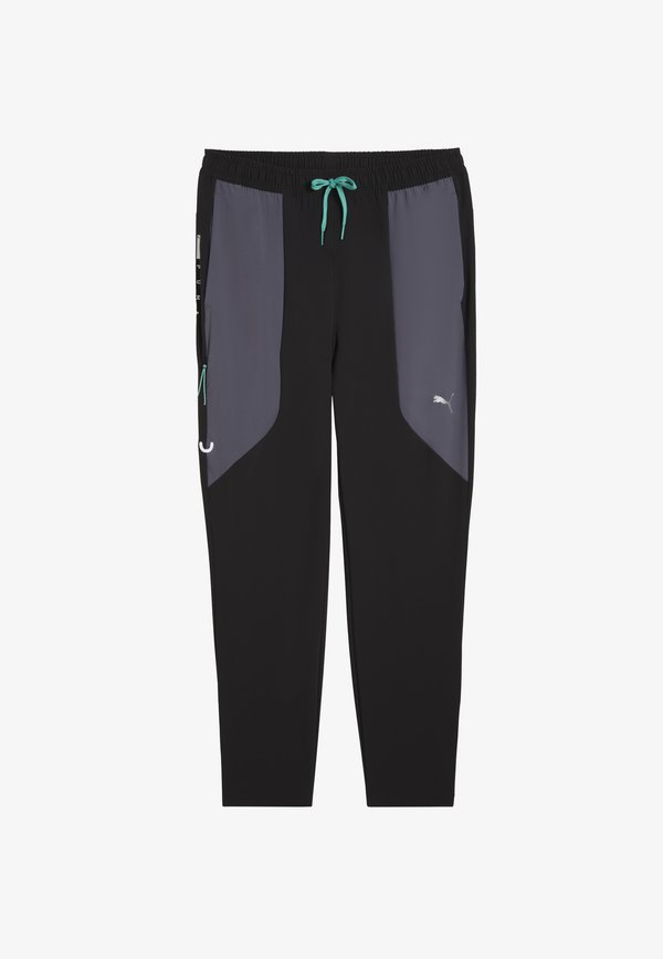 Puma Tracksuit bottoms - black-vibrant green