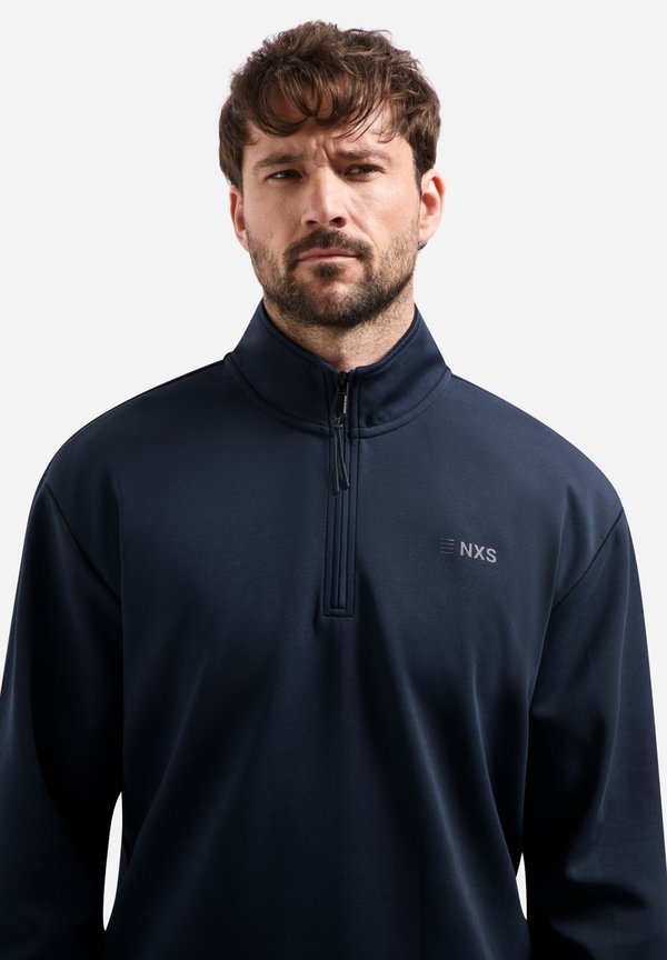 NO EXCESS HALF-ZIP