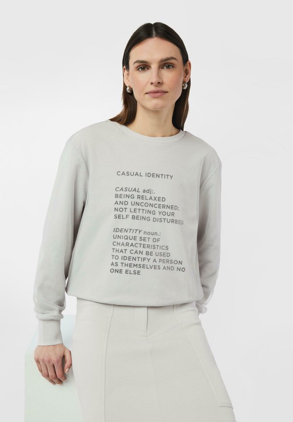 comma casual identity MIT FRONT UND LAYER