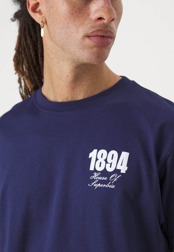 Legacies MANCHESTER CITY ROSE TEE