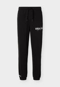 Puma CREW - Tracksuit bottoms - black