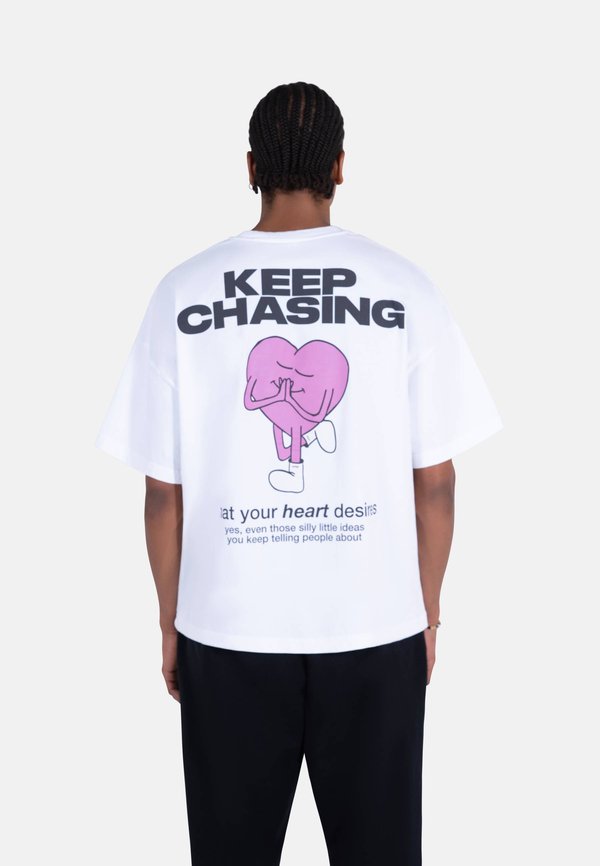 The Tracksuit Club KEEP CHASING UNISEX