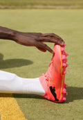 Puma FUTURE 7 MATCH FG/AG - Firm-ground football boots - sunset glow/black/sun stream
