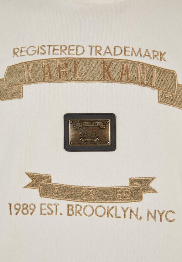 Karl Kani METAL PLATE OS