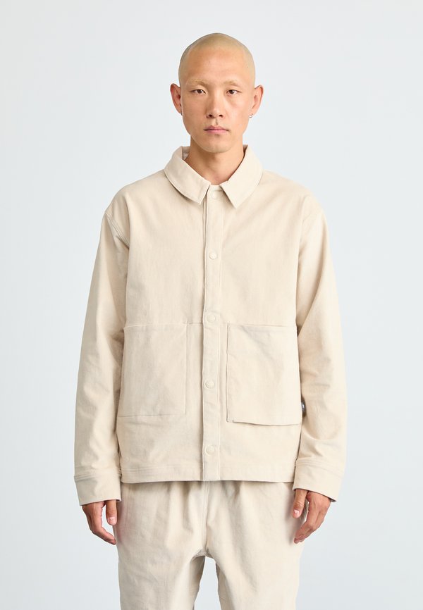 New Balance OVERSHIRT