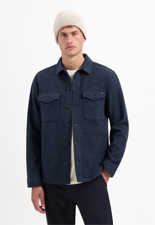 NO EXCESS BUTTON CLOSURE