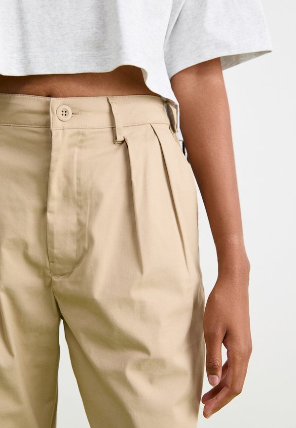 New Balance BOYLSTON TAPERED PANT