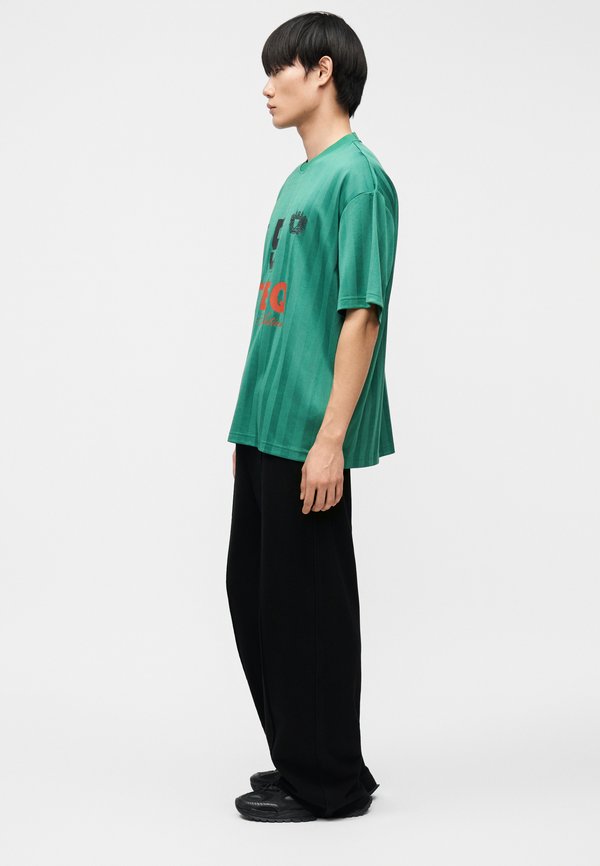 Han Kjøbenhavn LOGO TRAINING TROUSERS