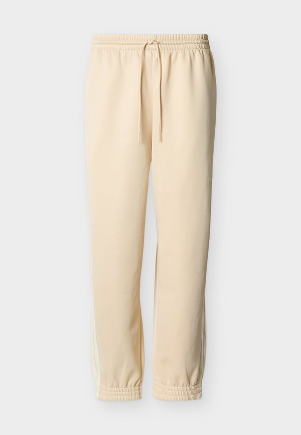 adidas Sportswear STADIUM TRACK - Tracksuit bottoms - beige/white