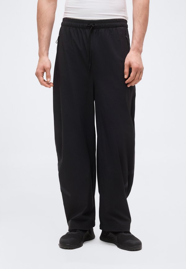adidas Sportswear Z.N.E. - Tracksuit bottoms - black