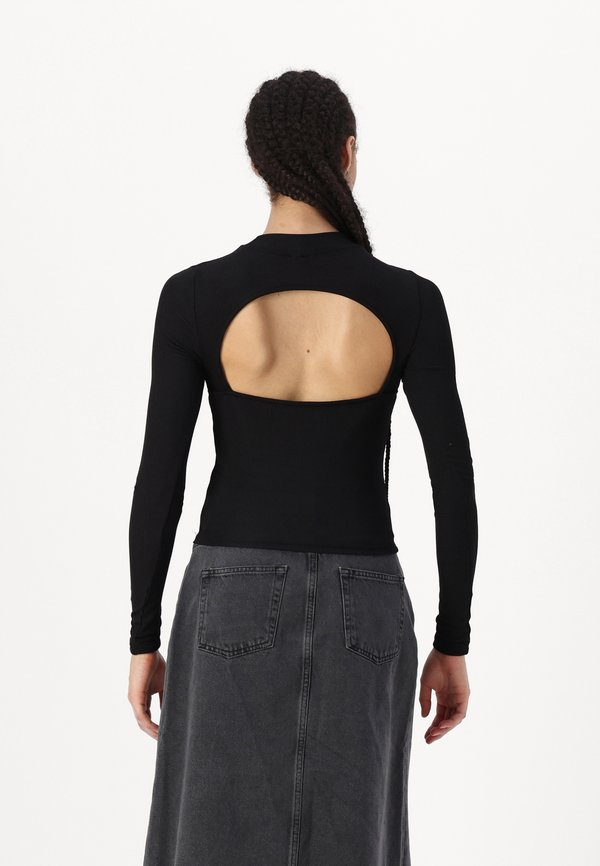 Noisy May NMANNIE OPEN BACK