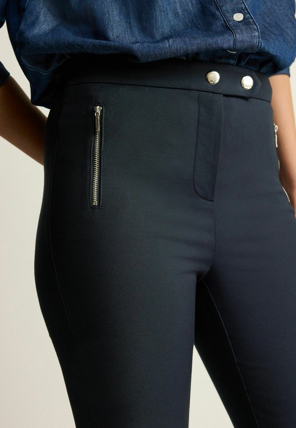 Next ZIPPED DETAIL