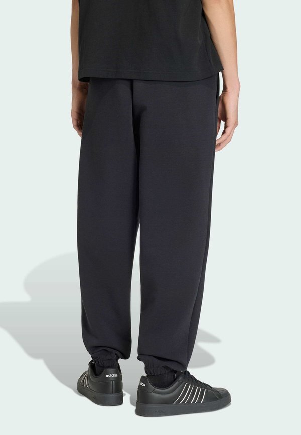 adidas Sportswear SOFT LUX PANTS - Tracksuit bottoms - black