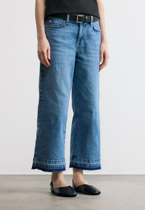 DKNY MID RISE RELEASED HEM