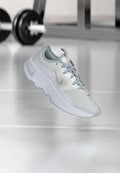 Nike Performance MOTIVA 2 - Trainers - white/metallic silver-coloured/pure platinum-coloured