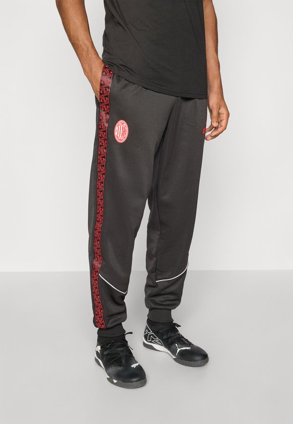 Puma ACM KING ANTHEM  - Tracksuit bottoms - black red
