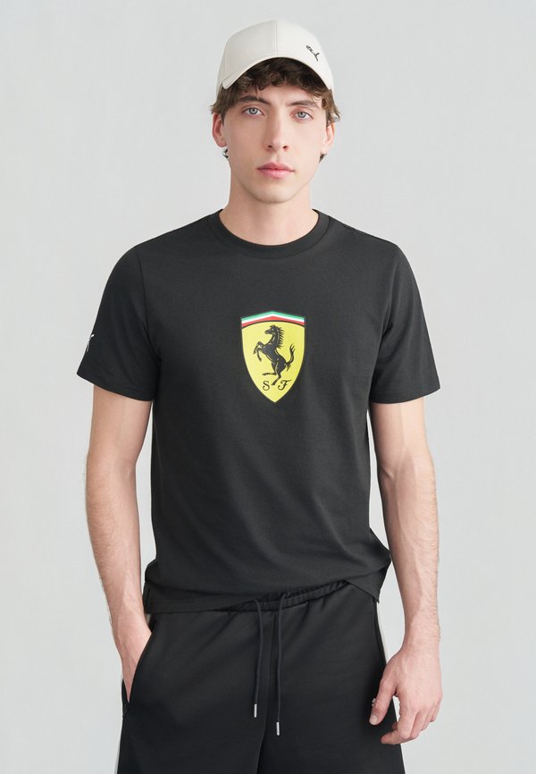 Puma COLORED SHIELD TEE - Print T-shirt - black