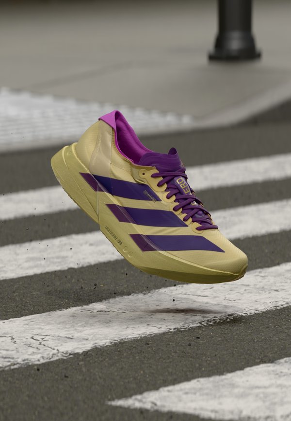 adidas Performance ADIZERO ADIOS PRO 4 - Road running shoes - sand/rich purple/gold-coloured metallic