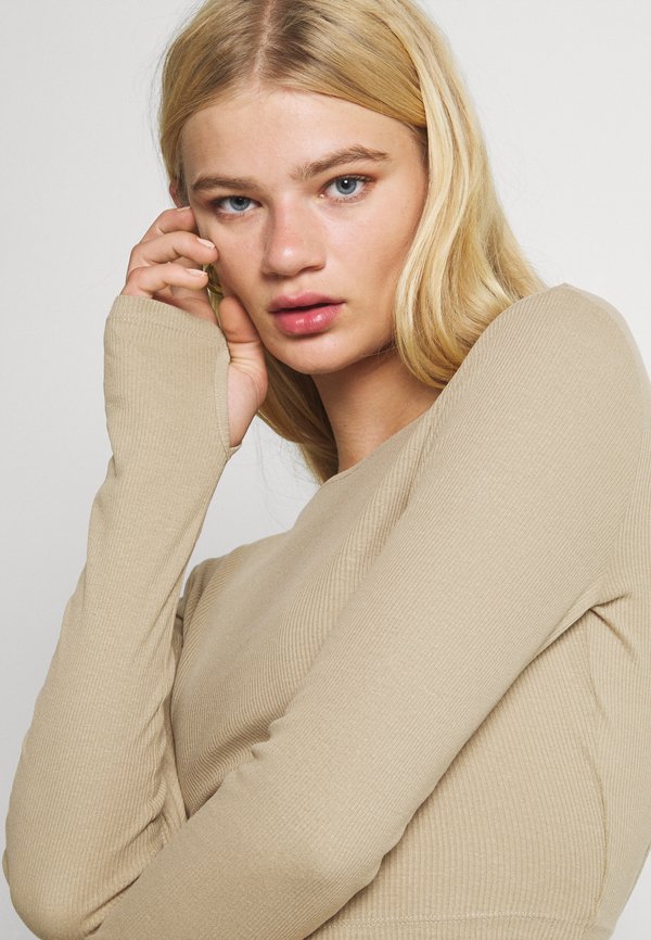 NU-IN CUTOUT TIE BACK
