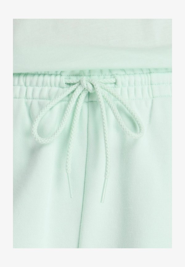 New Balance Tracksuit bottoms - cosmic jade