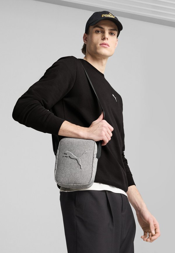 Puma BUZZ HEATHER - Cross body bag - medium gray heather