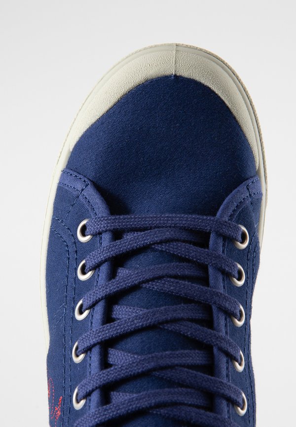 le coq sportif