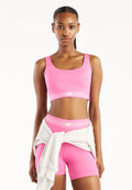 New Balance AC TRAIN BRA - Medium support sports bra - pink satin