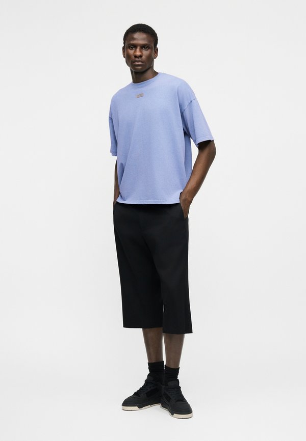 GCDS  LABEL STONE WASHED