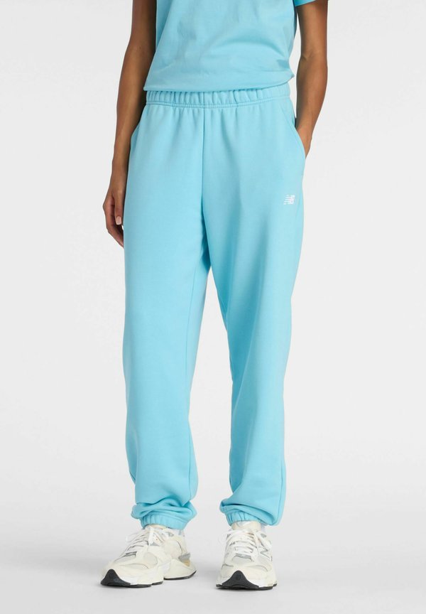 New Balance SPORT ESSENTIALS FRENCH TERRY JOGGER - Tracksuit bottoms - taffy blue
