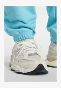 New Balance SPORT ESSENTIALS FRENCH TERRY JOGGER - Tracksuit bottoms - taffy blue