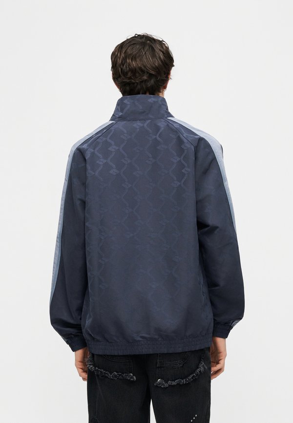 Puma RELAXED TRACK JACKET