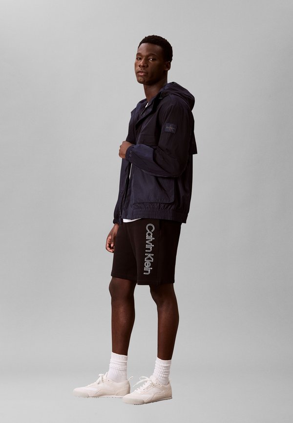 Calvin Klein GRAPHIC SHORT - Tracksuit bottoms - black