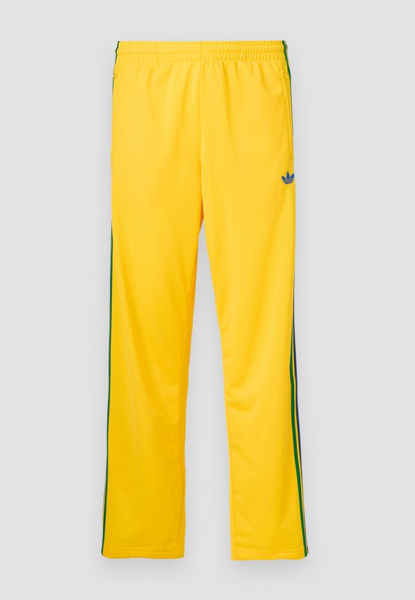 adidas Originals FIREBIRD TP - Tracksuit bottoms - yellow