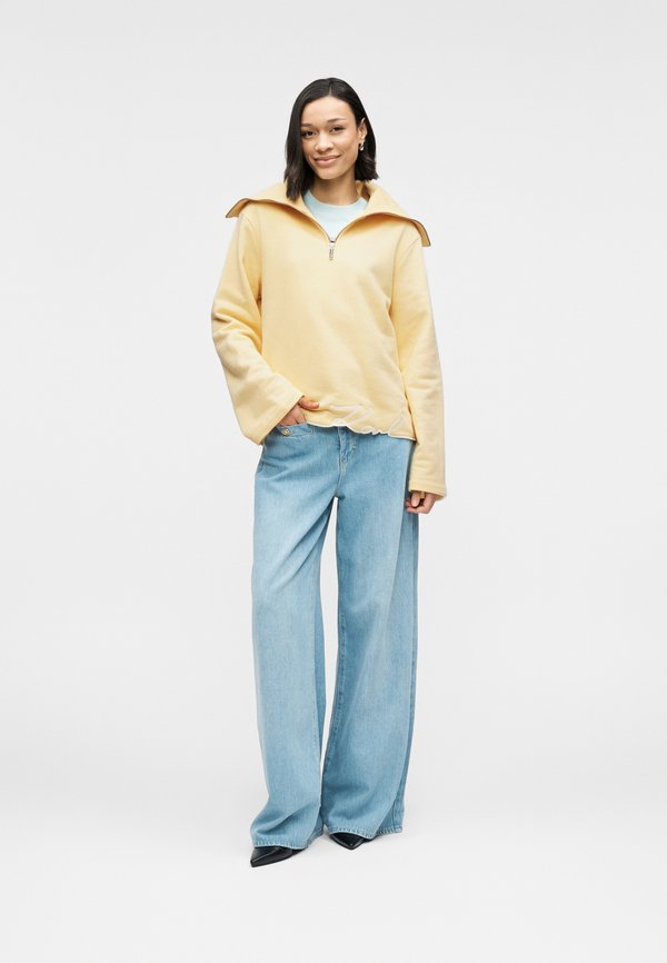 KARL LAGERFELD SIGNATURE HEM HALF ZIP UP