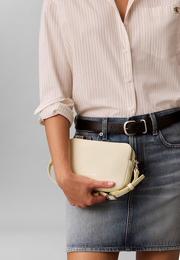 Calvin Klein WEBBING CAMERA BAG - Cross body bag - green essence