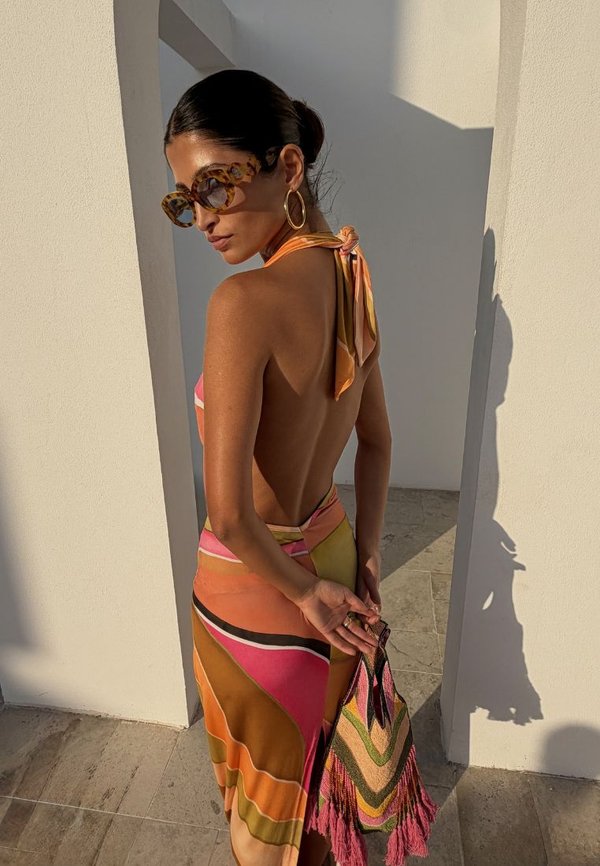 Never Fully Dressed