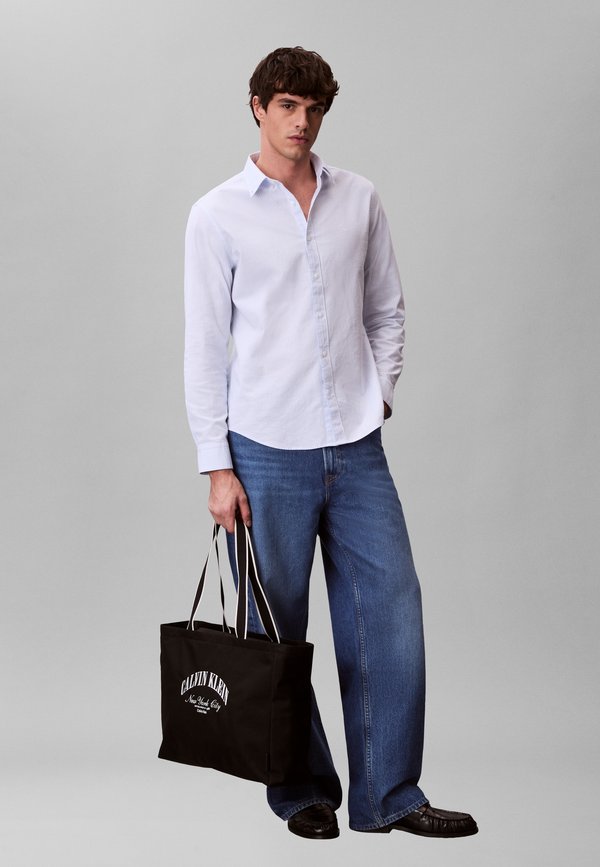 Calvin Klein GRAPHIC CAPSULE - Tote bag - black