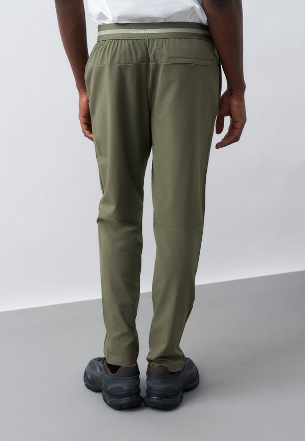 Calvin Klein ICON SPORT - Tracksuit bottoms - dusty olive
