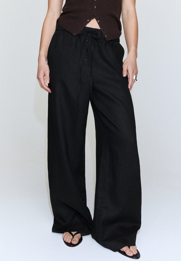 Mango ADULT - Trousers - black