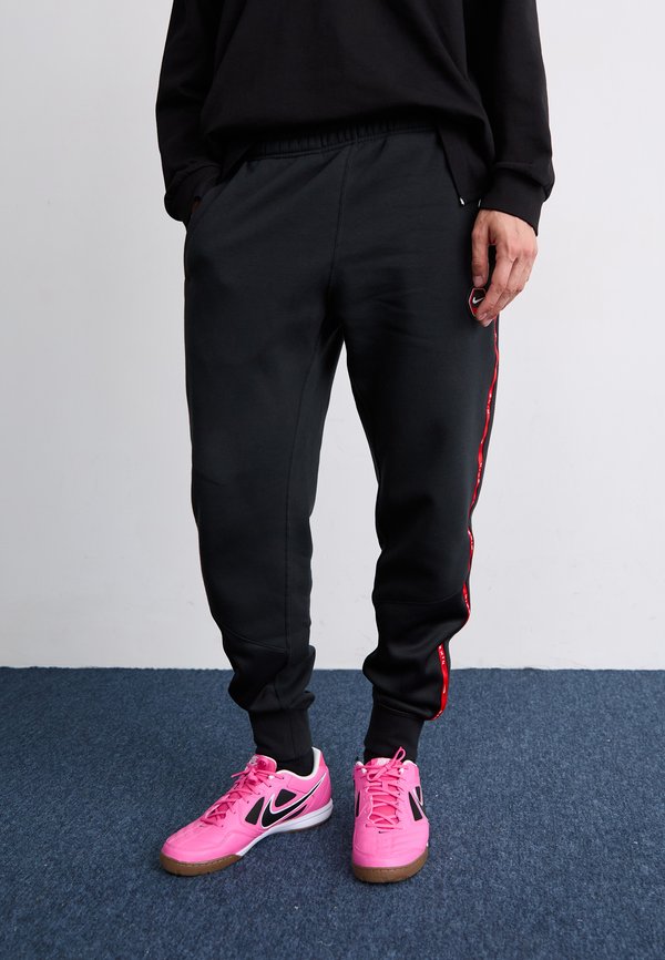 Nike Sportswear JOGGER - Tracksuit bottoms - black