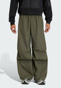 adidas Sportswear CITY TECH - Tracksuit bottoms - olive strata