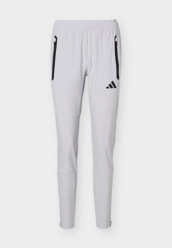 adidas Performance TIRO TRAVEL PANTS - Tracksuit bottoms - team light grey/black