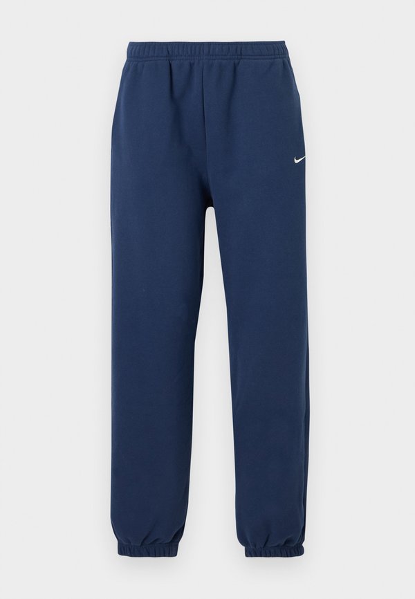 Nike Sportswear STUDIO FLEECE MEDIUM WEIGHT HIGH-RISE OVERSIZED CUFFED PANTS - Tracksuit bottoms - midnight navy/sail