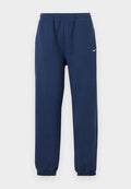 Nike Sportswear STUDIO FLEECE MEDIUM WEIGHT HIGH-RISE OVERSIZED CUFFED PANTS - Tracksuit bottoms - midnight navy/sail