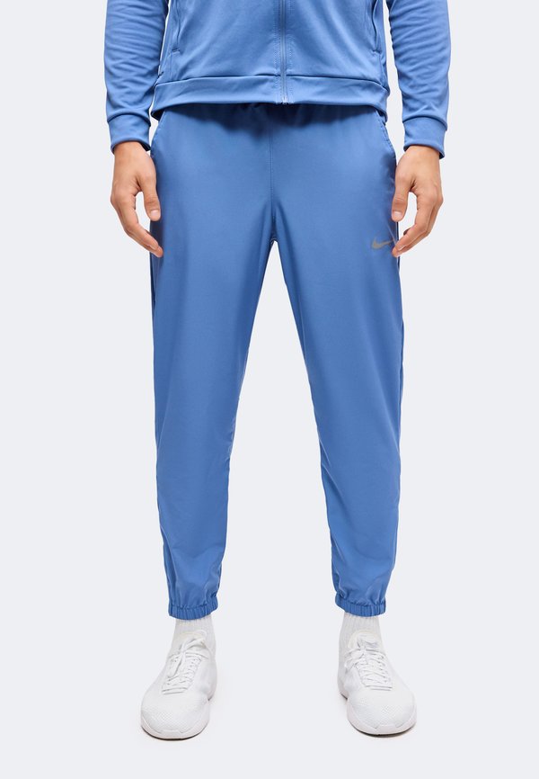 Nike Performance FORM - Tracksuit bottoms - indigo storm/white