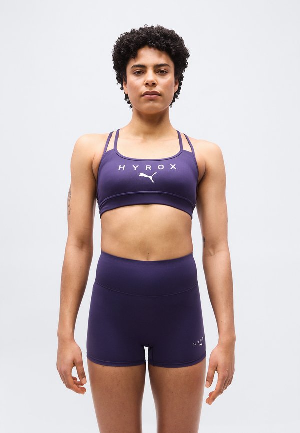 Puma PUMA X HYROX MOVE STRAPPY BRA - Medium support sports bra - deep plum