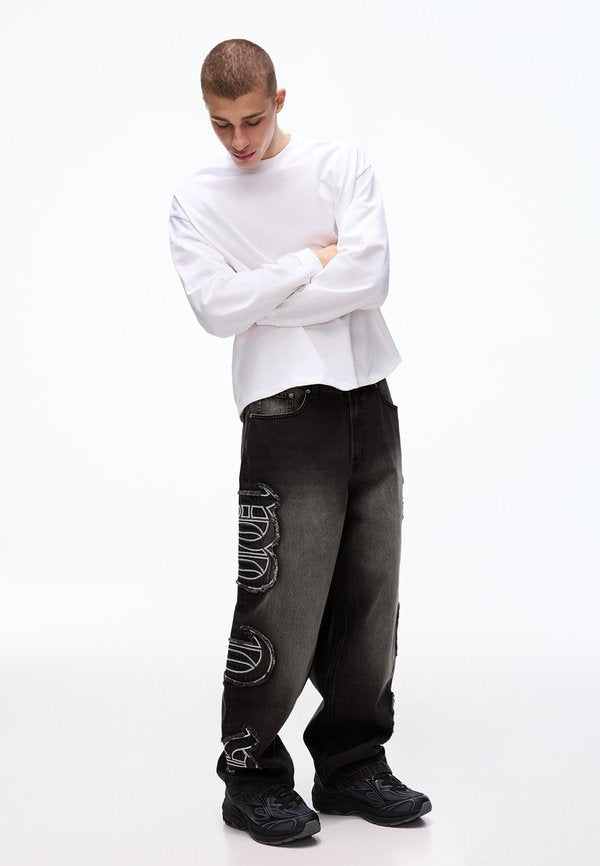 Bershka SUPER BAGGY PATCH - Baggy Jeans - black