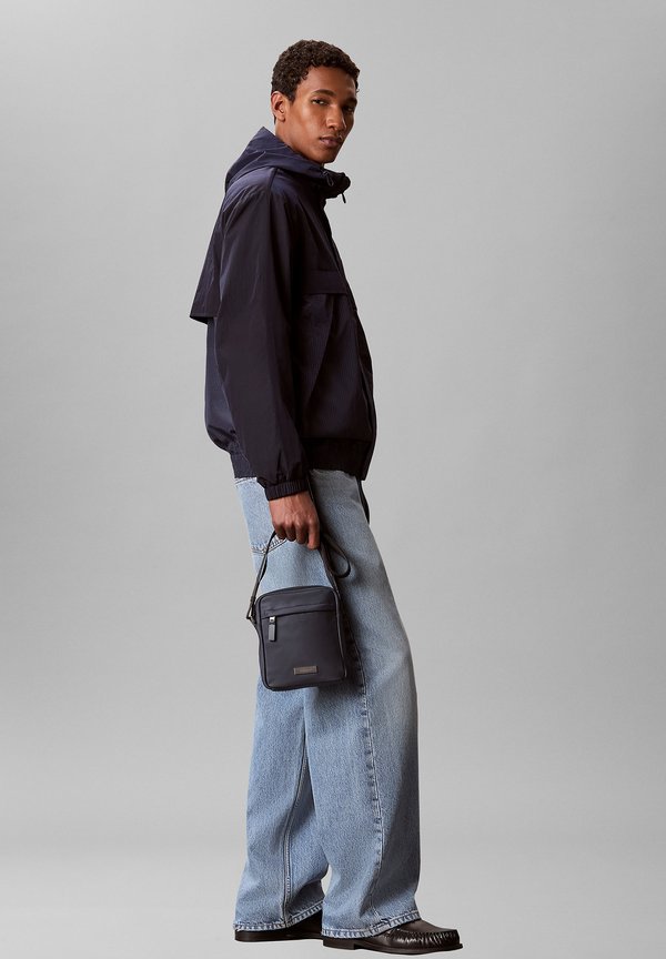 Calvin Klein CLEAN REPORTER - Cross body bag - slate blue